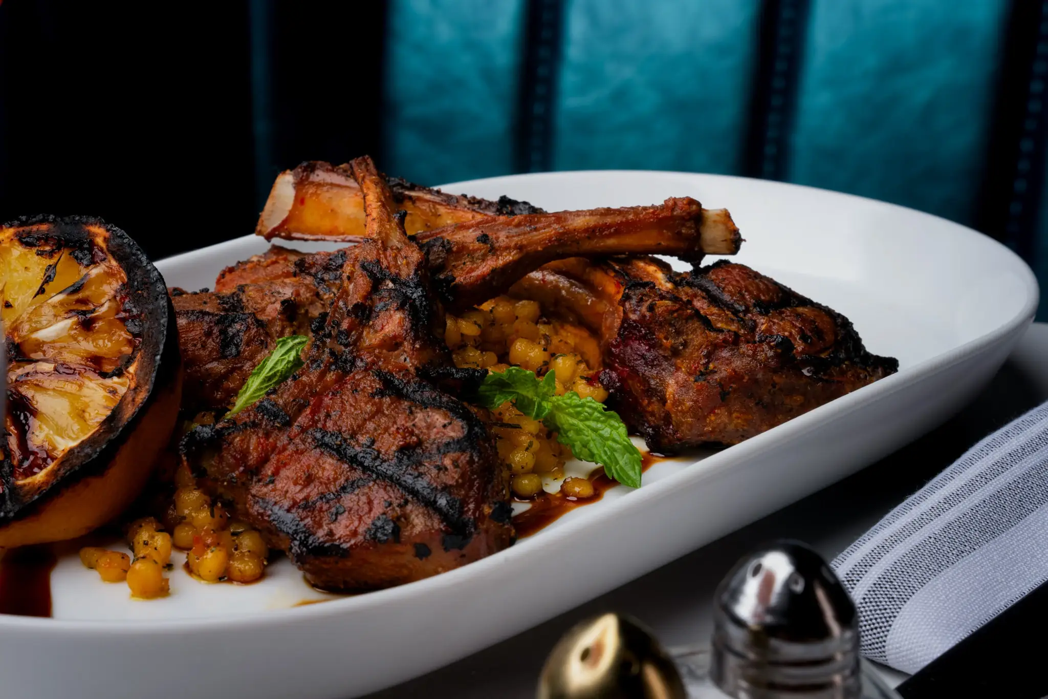 Grilled lamb chops served at an upscale restaurant in Alpharetta
