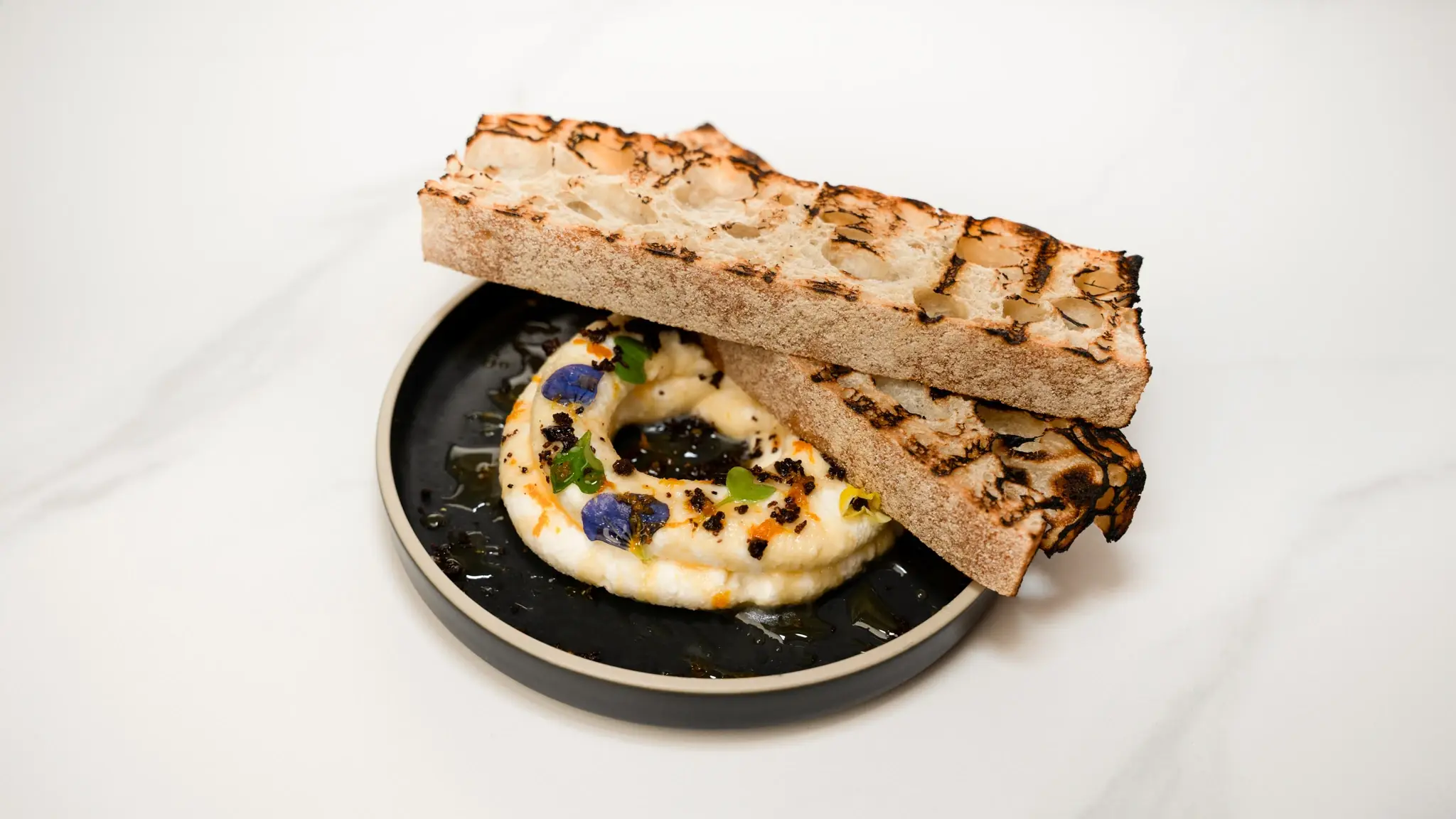 Whipped feta with burnt honey at Siena, a Mediterranean restaurant in Alpharetta