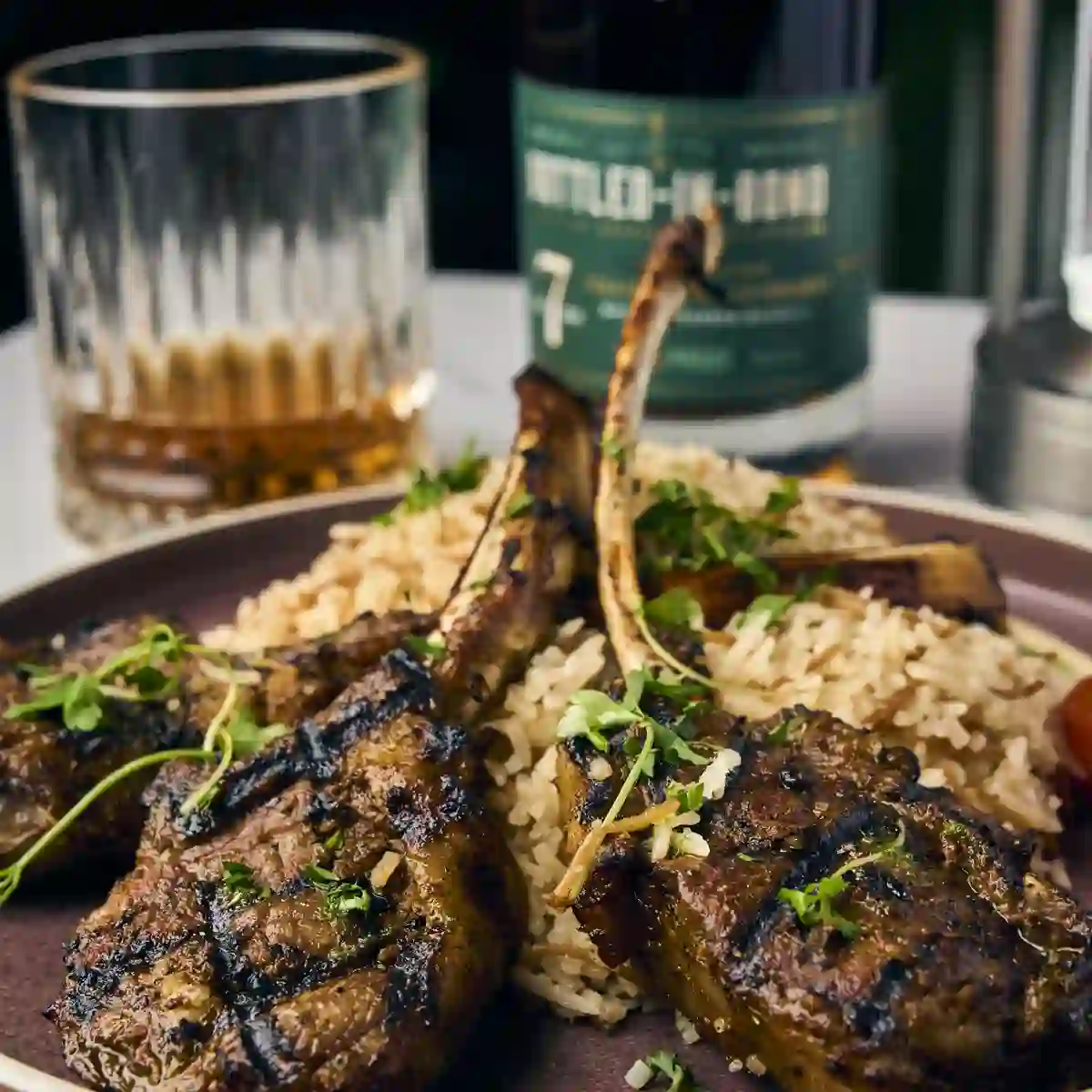 Grilled lamb chops over rice pilaf from the dinner menu at Siena in Alpharetta