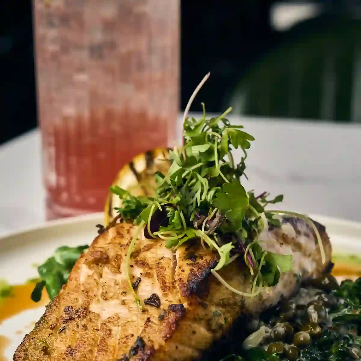 Salmon Limone, pan-seared salmon with capers and broccolini at Siena in Alpharetta